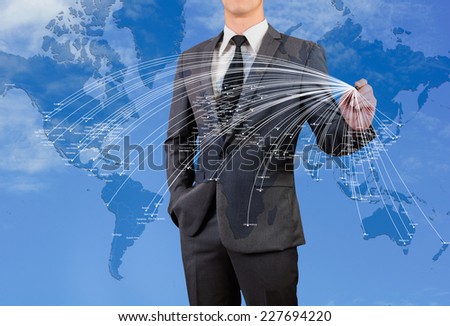 businessman drawing line on world map concept of globalization