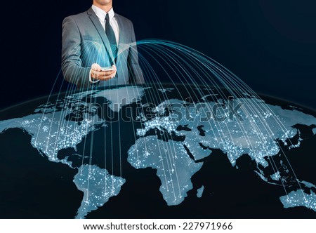 businessman using smart phone connecting to the world