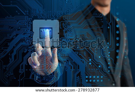 businessman touching glow CPU and electronics circuit