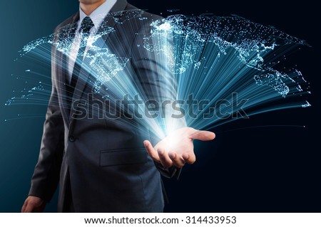 businessman holding world map made from glow line