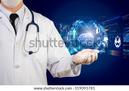 doctor holding glow hi-tech healthcare interface
