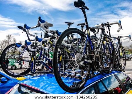 VITORIA-GASTEIZ, SPAIN - APRIL 3: A cycling team car carrying bikes in the Tour of the Basque Country. April 3, 2013 in Vitoria Gasteiz, Basque Country, Spain