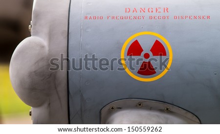Radiation danger sign warning about radio frequency danger on  an military aircraft the a pod