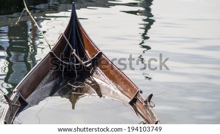 Sinking viking ship like boat from the back