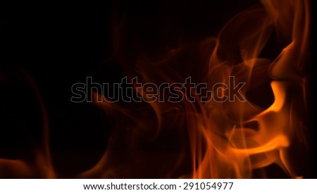 Slow burning, low oxygen, flames on black background