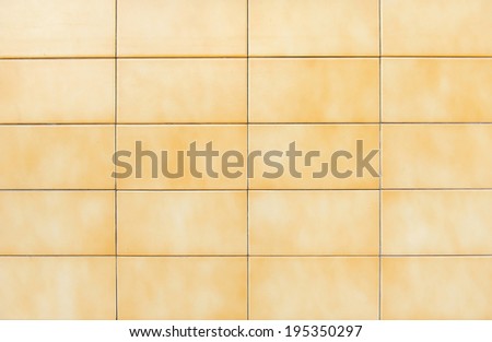 Brown of diamonds pattern tile wall.