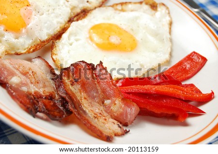 Breakfast - egg, bacon and vegetables (shallow DOF)