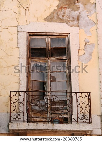 Old broken door in Alfama, Lisbon in Portugal