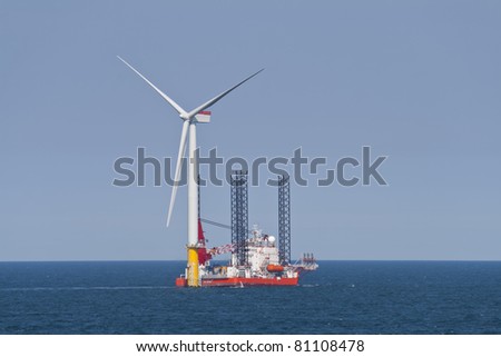 Wind turbine off the Norfolk Coast being constructed by a jack-up vessel