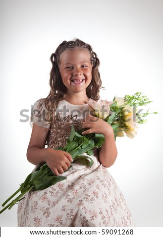 stock photo : Cute little girl with pigtail hairstyle showing two missing 