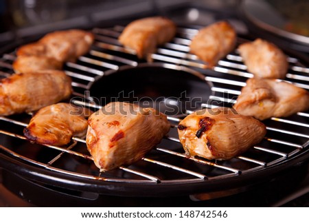 Delicious grilled chicken on gas grill