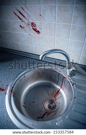 Bloody kitchen tile and washbasin, Halloween or crime concept