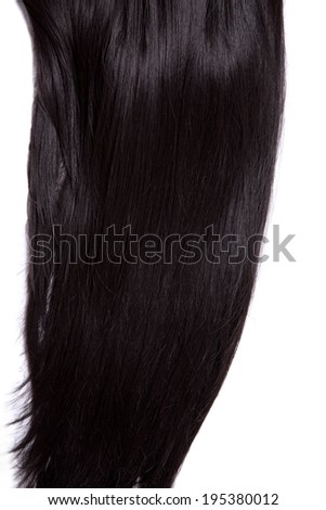 Texture of black shiny straight hair, soft focus