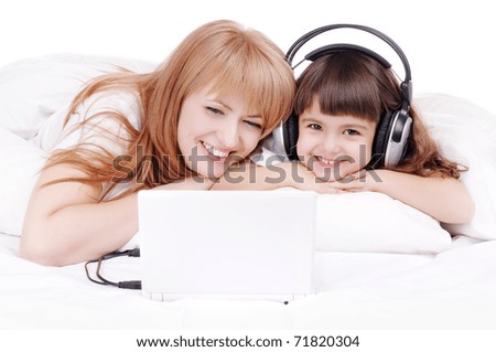 Happy family watching a movie on their computer