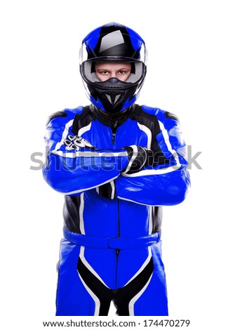 Motorcyclist biker in dark blue  equipment on white background crossed hands