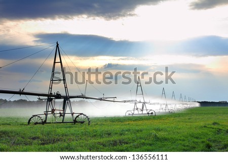 landscape with automatic irrigation of agriculture field