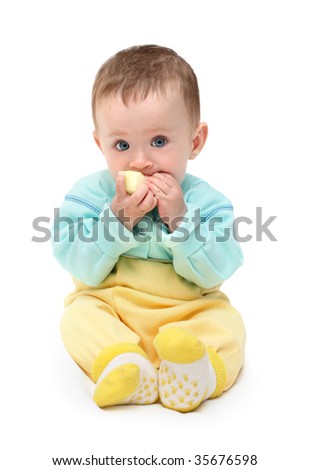 small baby biting apple isolated on white