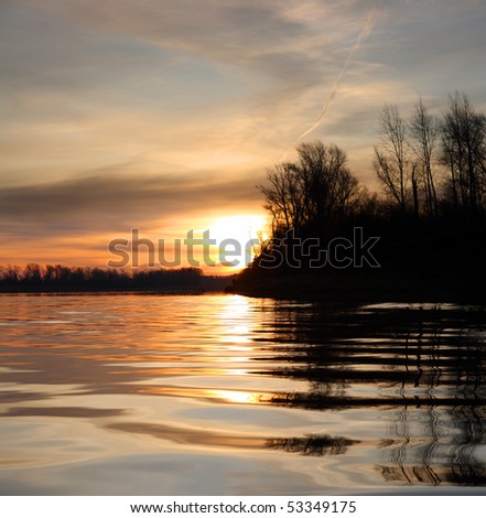 river landscape with sunset against ripple water