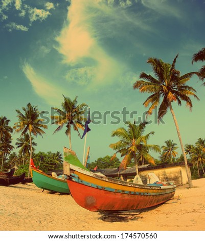 old fishing boats on indian beach vintage retro style old fishing boats on indian beach vintage retro style
