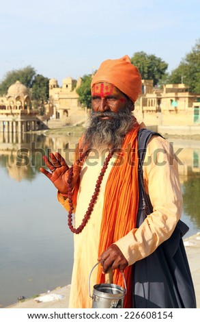 JAISALMER, INDIA - NOVEMBER 28, 2012: Holy Sadhu men with traditional painted face in Jaisalmer, India.