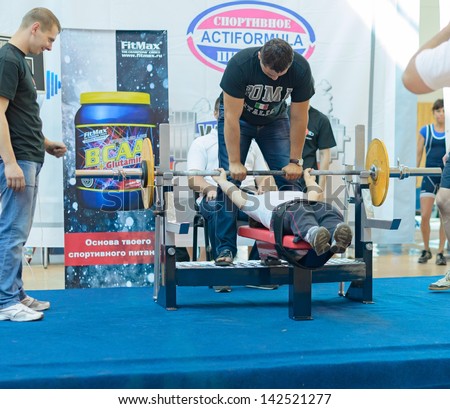 MOSCOW, RUSSIA - JUNE 13: participation of persons with disabilities in action during the Russian championship on powerlifting event in Moscow on June 13, 2013.