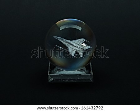 Laser engraving plane inside the glass on a black background.