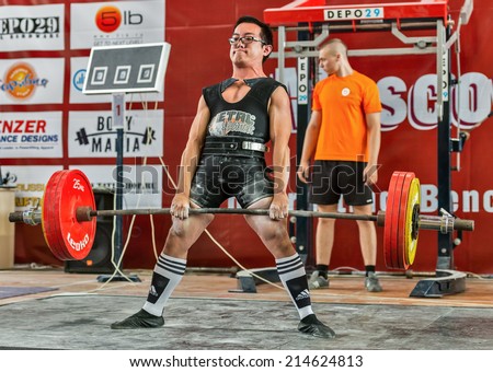 Moscow, Russia - August 22, 2014: Unidentified athlete in action during the 2014 world Cup powerlifting event in Moscow.