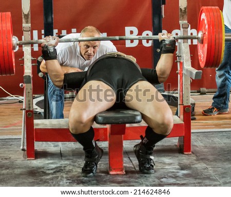 Moscow, Russia - August 23, 2014: Unidentified athlete in action during the 2014 world Cup powerlifting event in Moscow.