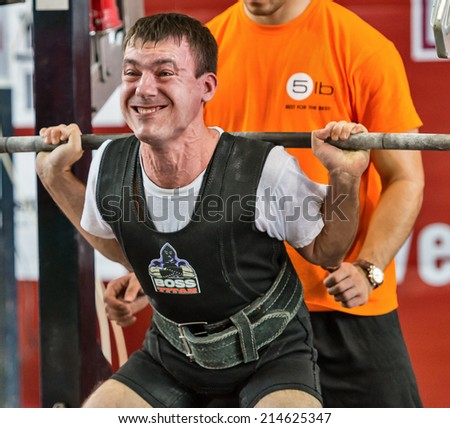Moscow, Russia - August 22, 2014: Unidentified athlete in action during the 2014 world Cup powerlifting event in Moscow.