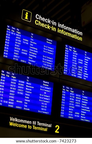Check-in information monitors in Kastrup, airport of Copenhagen