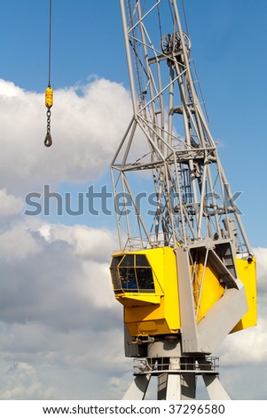 Crane in a sea industrial freight port. General view