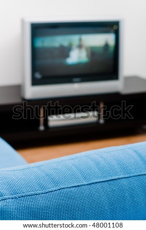 Sofa and TV in a modern simple interior