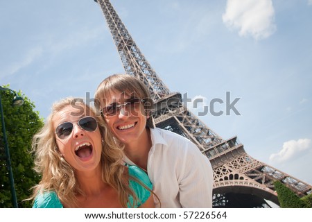 Happy young couple having fun in Paris France Happy young couple having fun in Paris France