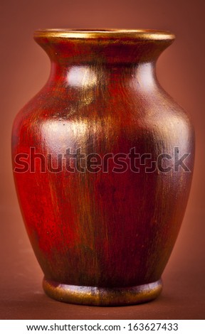 Old clay vase whit flower theme