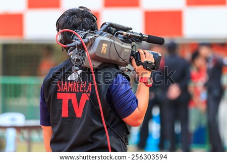 SISAKET THAILAND-FEBRUARY 18: Cameraman during Thai Premier League match between Sisaket FC and BEC Tero at Sri Nakhon Lamduan Stadium on February 18,2015,Thailand