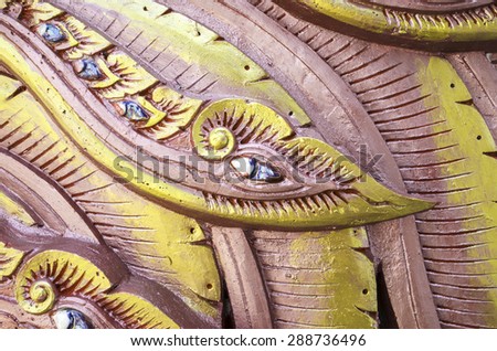 Scales of the dragon statue. Stucco surface of the animal