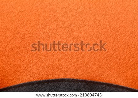 Black and orange leather texture background - rough surface