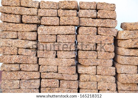 Store of bricks ready for building or sale. Construction materials and outdoor storage.