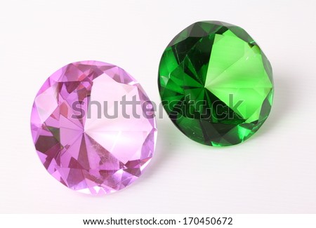 Purple and green diamond on white background