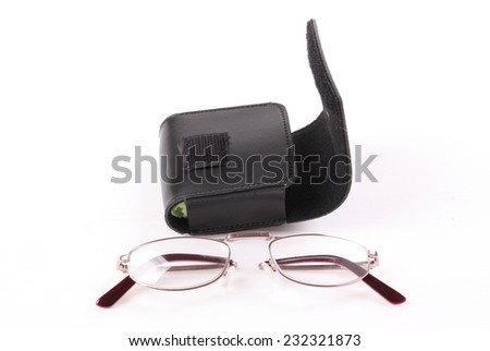 Eyeglasses and black leather eyeglasses case isolated on white