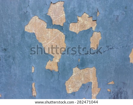 Old peeling paint and dirty on old blue concrete wall background