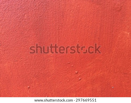 Texture concrete painted with red paint