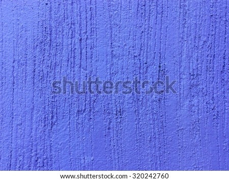 Texture concrete painted with purple paint