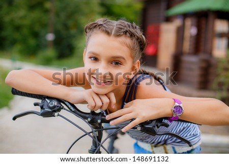 beautiful teenage girl on bike trip