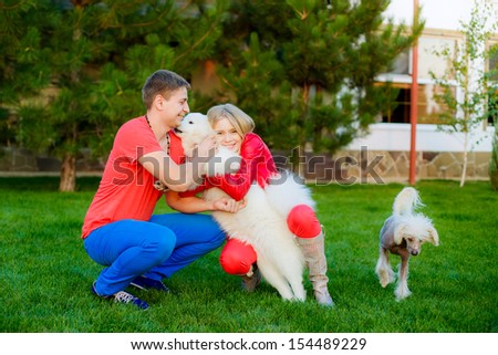 a young married couple trained dogs
