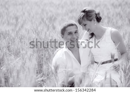 series. a love story. the couple in the wheat field. black-and-white photo