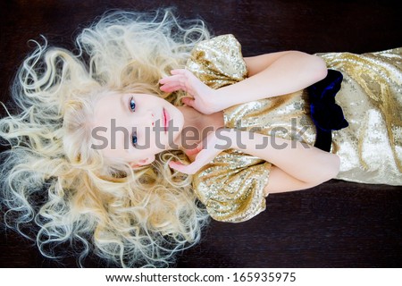 fashion portrait of a young blond woman. shooting from the top point. shocking