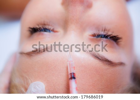 Beauty woman giving botox injections. botox, cosmetic treatments, wrinkle removal, Botox injections
