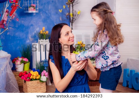 happy family. mother daughter in the room.  Mother\'s Day. March 8, International Women\'s Day.