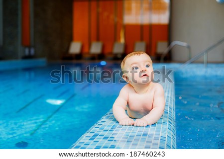 little beautiful boy in the pool. prevention of diseases of the musculoskeletal system. Swimming lessons for children.